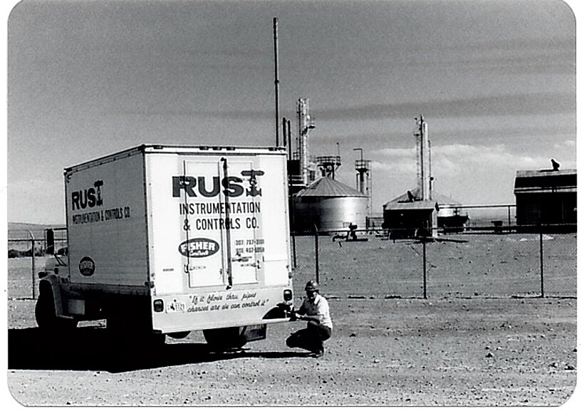 A Rust Instrumentation & Controls Co. truck at a tank farm, 1976